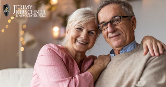 Happy older couple looking at the camera